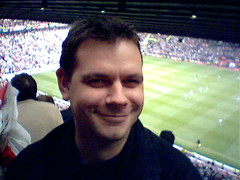 Looking smug at half-time with the Old Trafford pitch behind me