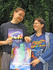 Ben and Irma holding a poster of Finncon 2006