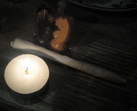 Candle, spliff, chess pieces