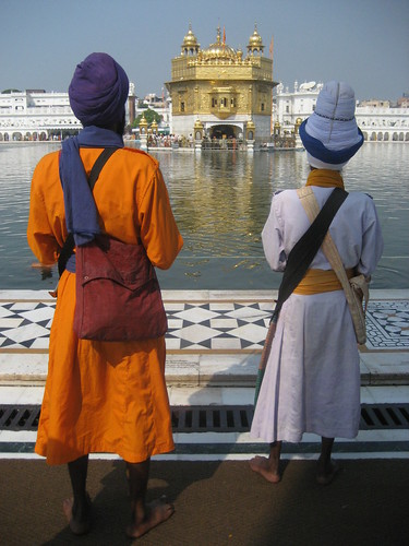 sikhs overlooking the golden temple