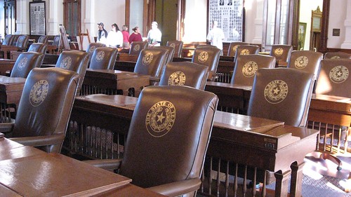 Leather chairs with state emblem