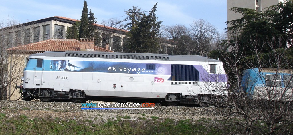 The BB 67560 Diesel locomotive (from Marseille-Blancarde) with its new 'En voyage' livery near the Aix-en-Provence SNCF station in February 2006