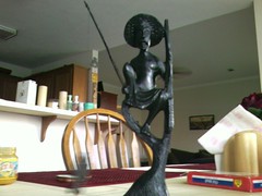 Statue of a stilt fisher. Product of Sri Lanka.