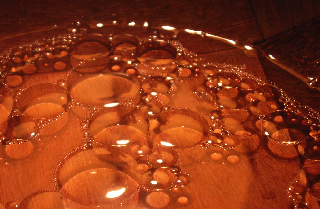 Oil and Vinegar in a Wooden Bowl
