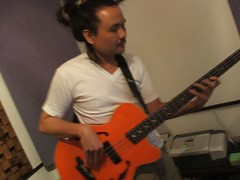 Erick bass player of Firebottle blues band in the recording studio