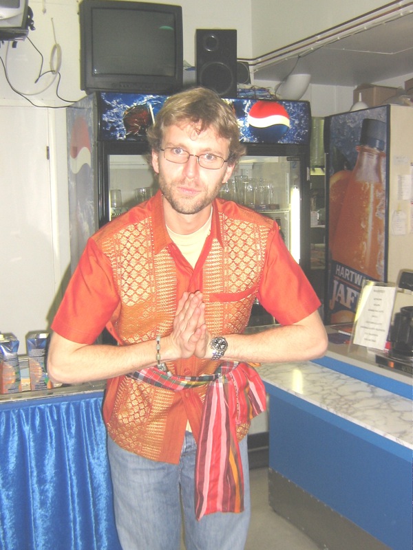Benjamin modeling a Thai outfit