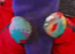 Hands holding purple ice