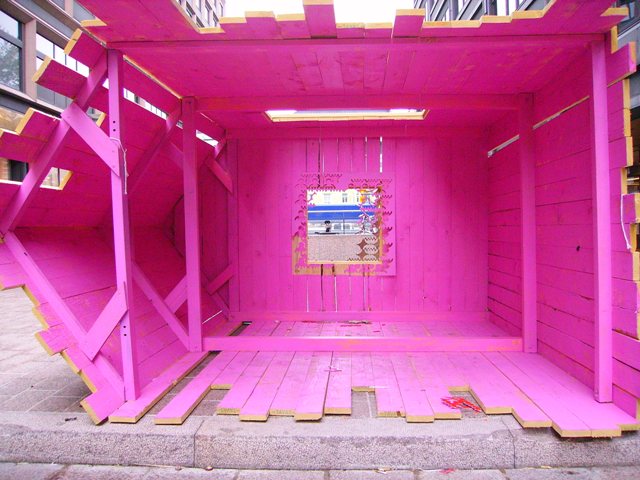 pink halfhouse on its side
