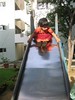 Coming down the slide outside Seenu thatha's house