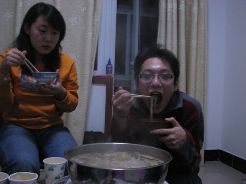 Kevin and friend eating hotpot