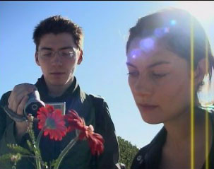 Production Photo 6 - Maya and Wiler Look At Flowers