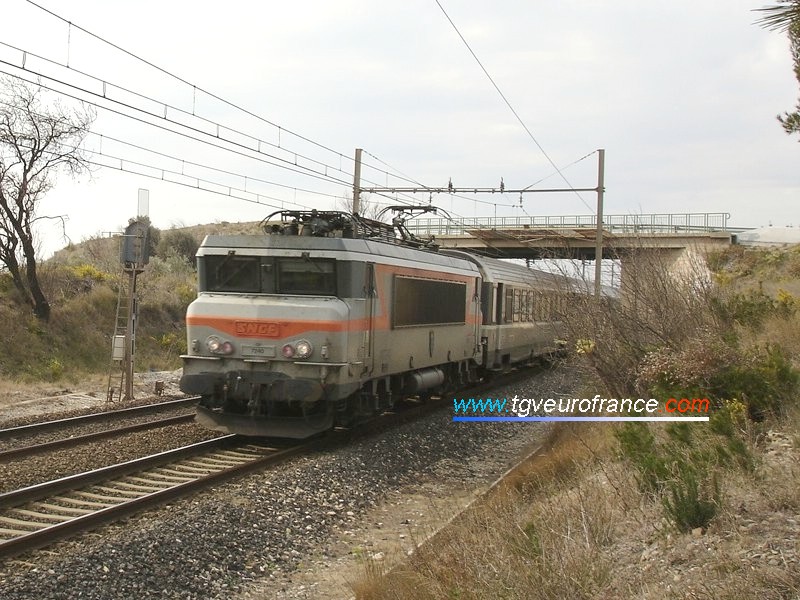 A BB 7200 Alsthom locomotive with a passenger train heading for Marseille Saint-Charles
