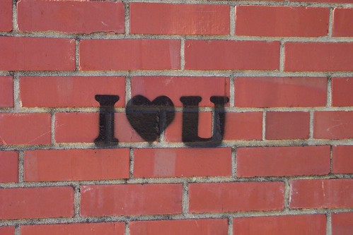 I “found” this graffiti art on a brick wall in town: i love you