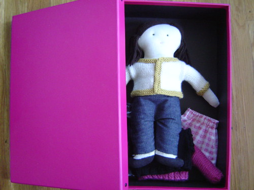 doll in her box