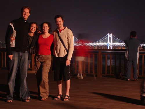 Me, Steph, Anoushka and Hugh at the 2005 APEC site... Gwangan Bridge in the background