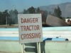danger tractor crossing