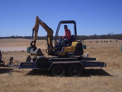 dad with digger while unloading.jpg