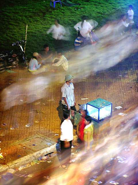 Steamed bun vendor at water festival