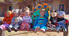 row of costumed toddlers