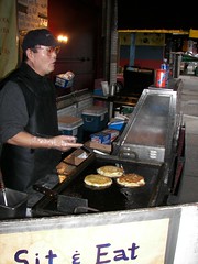 Cooking Asian food outside on the street