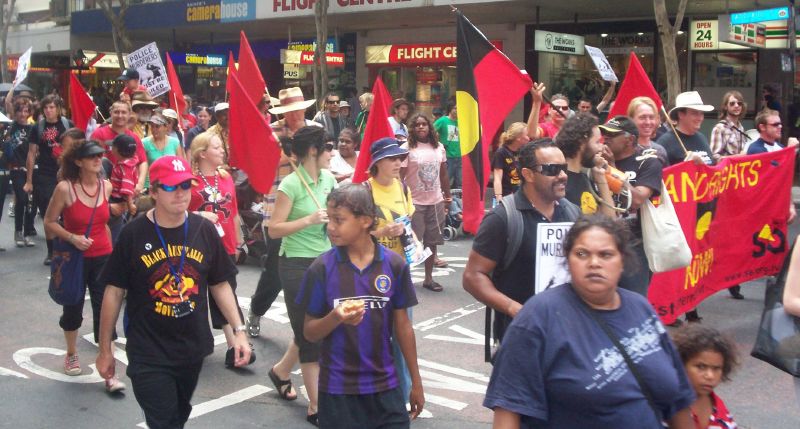Body of the march passes through the Adelaide St and Edward St intersection, turning right into Edward St-2 - Justice for Mulrunji Rally at Queens Park and March through Brisbane City, Australia, November 18 2006