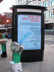 Bus advertising in a street kiosk, Pittsburgh