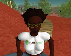 Ruby Glitter wearing RootsCamp t-shirt