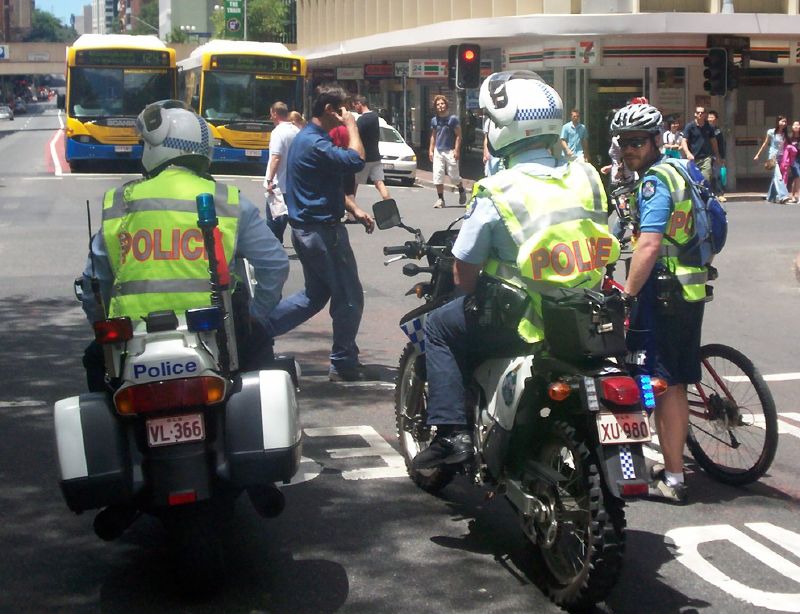 Two Wheeled police at the corner of Adelaide St and Edward St - Justice for Mulrunji Rally at Queens Park and March through Brisbane City, Australia, November 18 2006
