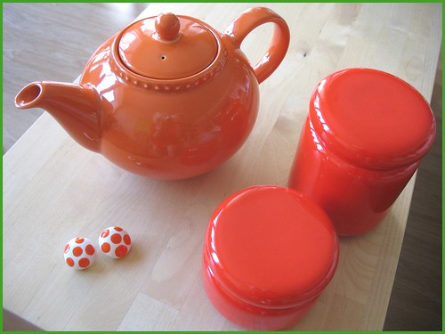 my new tea pot!  and (some) thrifted orange things.