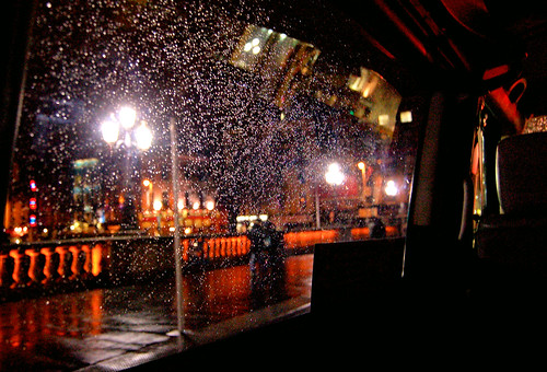 Rainy O'Connell Bridge from the back of a taxi
