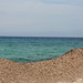 Formentera - mujer de arena contra el mar