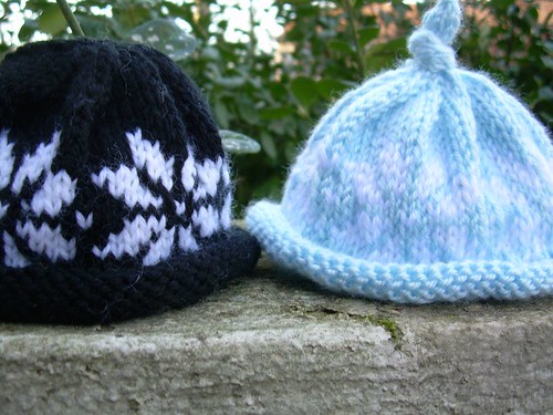 a pair of snowflake hats