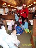 storytelling with the children sitting in the aisles