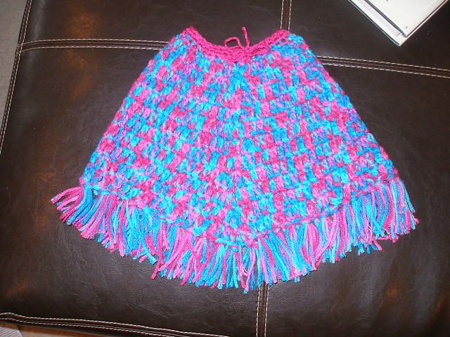 Free Crochet Pattern 779 Baby Poncho : Lion Brand Yarn Company