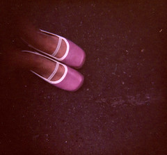 Ghostly feet in pink shoes