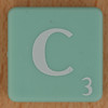 Scrabble white letter on pale green C