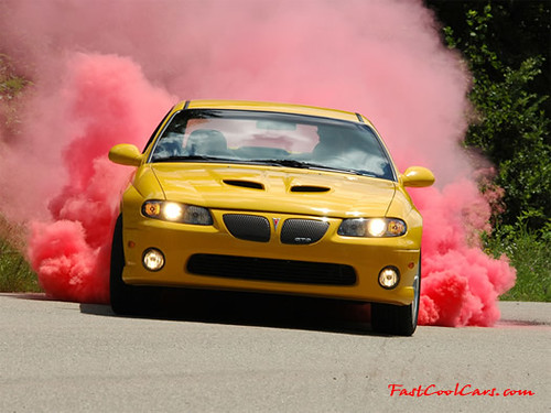 Pontiac GTO with Kumho colored smoke tires doing a burn out - Drift  Japan Blog
