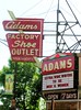 Adams Factor Shoe Outlet Sign