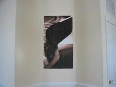 piano picture hung in entry