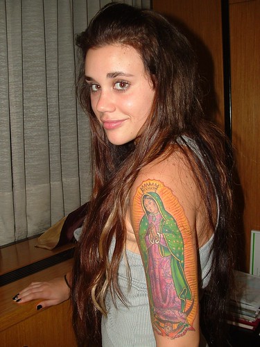 Pretty Tattooed Woman from Argentina with Religious Tattoo