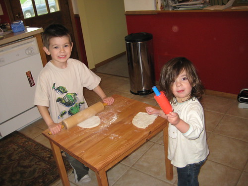 Jack and Lucy making pizza