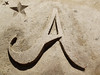 The letter A out of sand