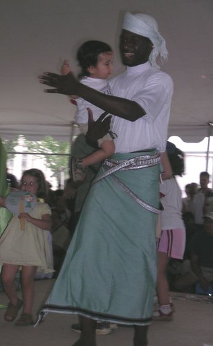 Omani dancer with audience member