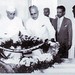 Jawaharlal Nehru laying a wreath on the Founder's grave