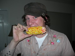 Adam chomps down on candy corn on the cob