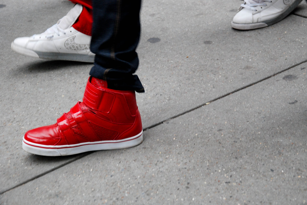 High tops are ruling the street. These in bright red are especially 
