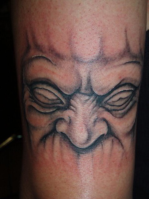 Evil Face Tattoo By Jon Poulson