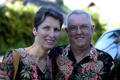 mom and dad in matching aloha wear