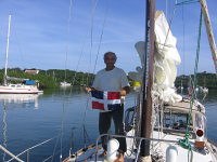 Ross raising Dominican Republic Flag after clearing in 