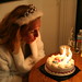 Mom blows out candles
